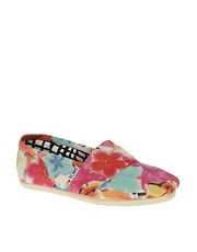 Zapatos planos de lona con estampado floral de Toms